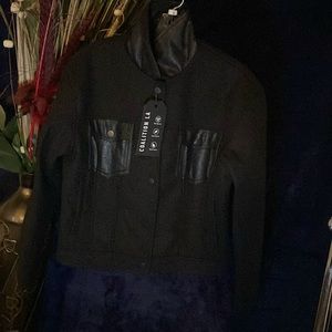 Heavy duty classy and chic jacket. Dress it up or dress down. Anyway is a plus!